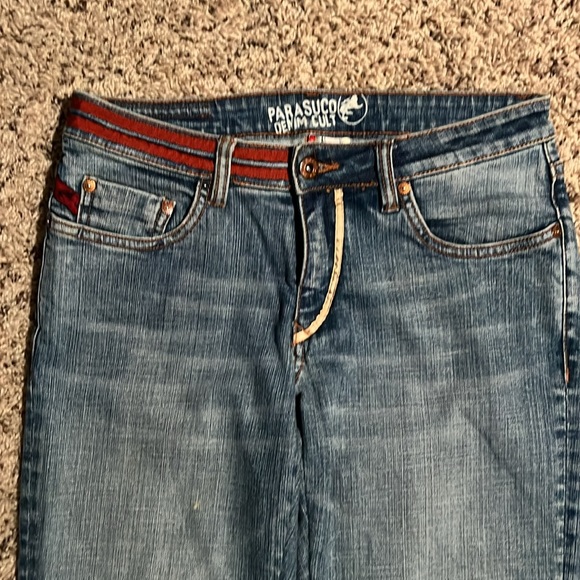 Size 29 flare jeans with maroon brown and tan ribbon designs on bottom parts - Picture 4 of 7